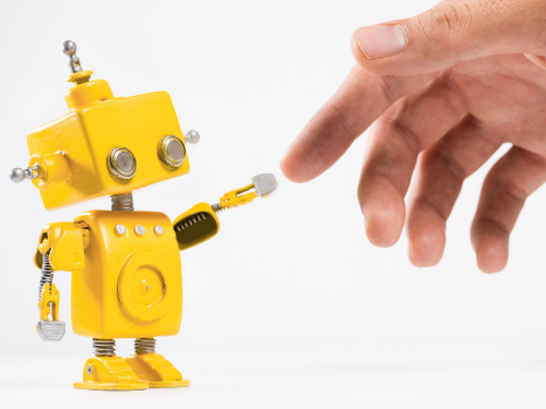 Robot reaching toward a human hand
